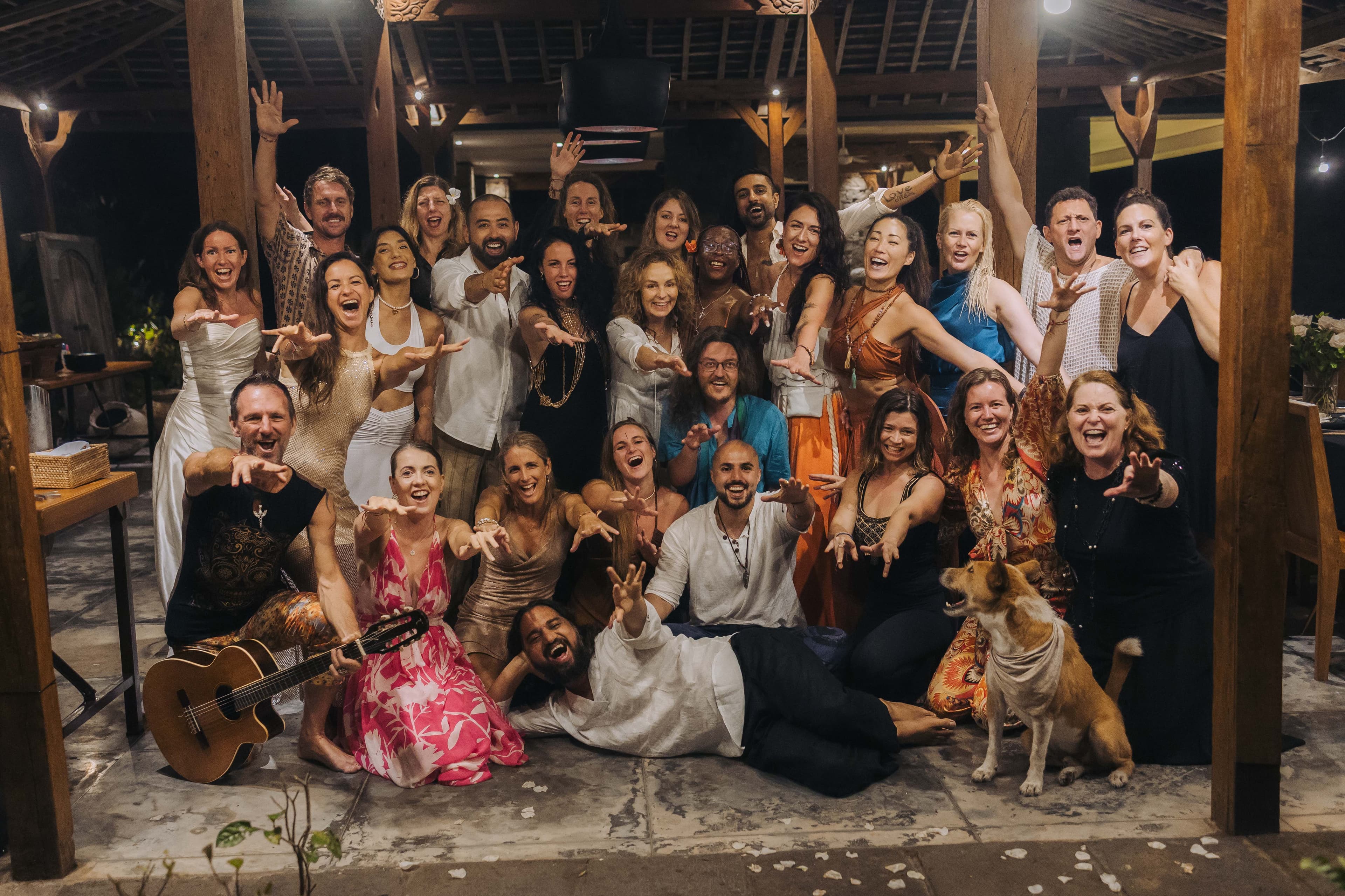 Kirsty celebrating with a large group at night