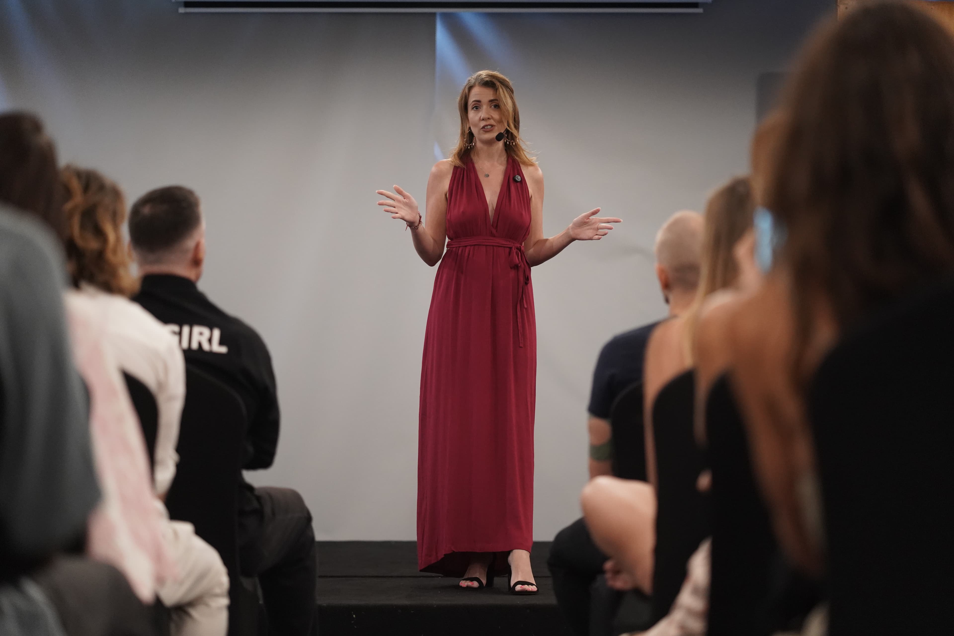 Kirsty Jayne Tait speaking on stage, full length