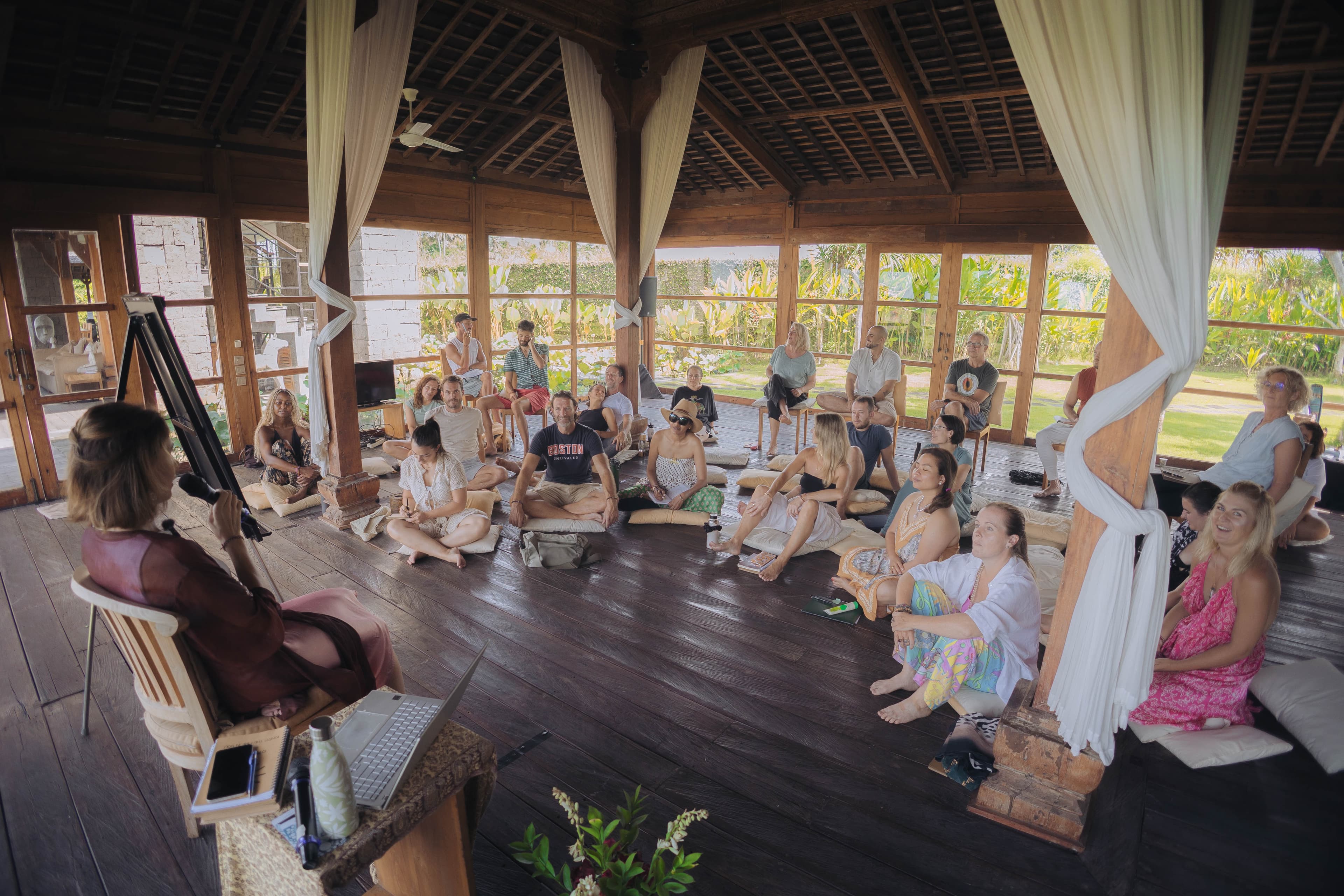 Kirsty Jayne Tait facilitating a retreat session in an open-air pavilion